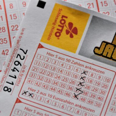 Detailed close-up of a EuroJackpot lottery ticket with selected numbers in focus.
